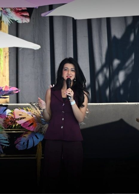 Aliya Rajah, Lead Practitioner and Executive Presence & Public Speaking Coach, speaking at an event